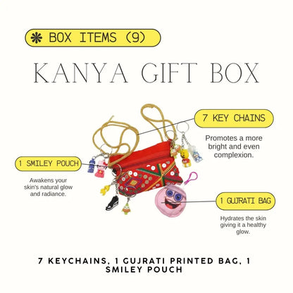 Kanya gift box with keychains, Gujrati printed bag, and smiley pouch on a white background